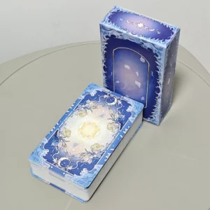 Coffret bleu ornementé et paquet de cartes du Tarot des silences